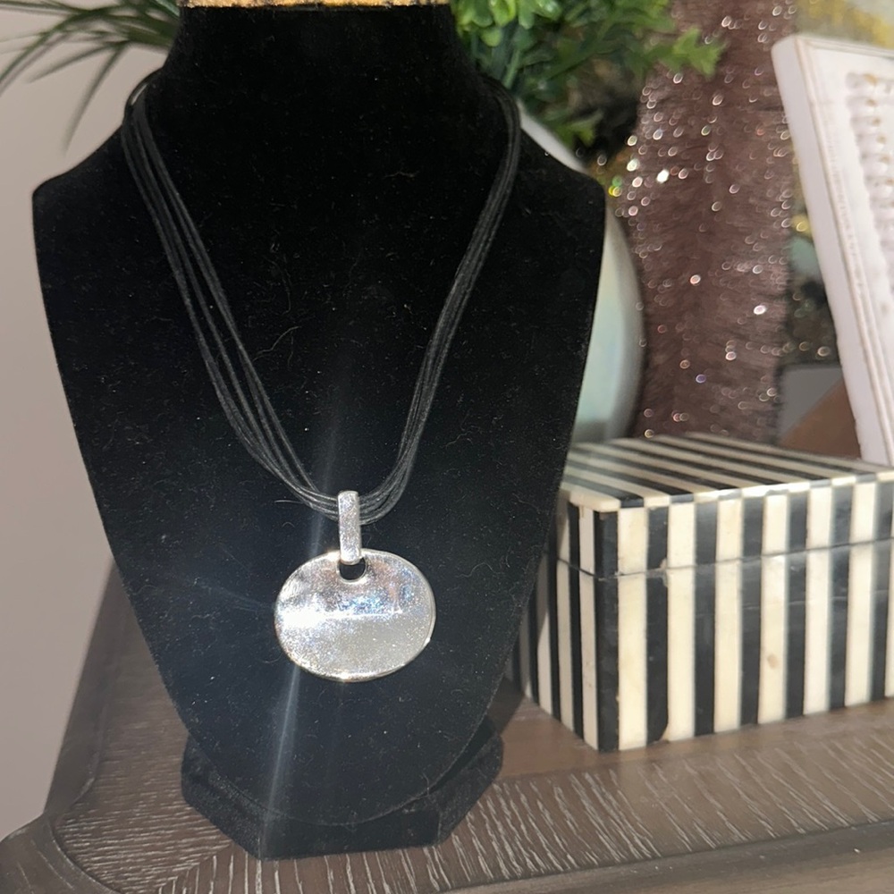 Silver pendent circle on black several layers of leather chain with silver ext